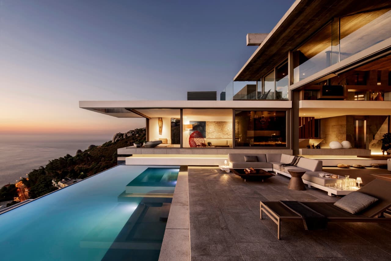 Luxury property at sunset, showcasing rental potential